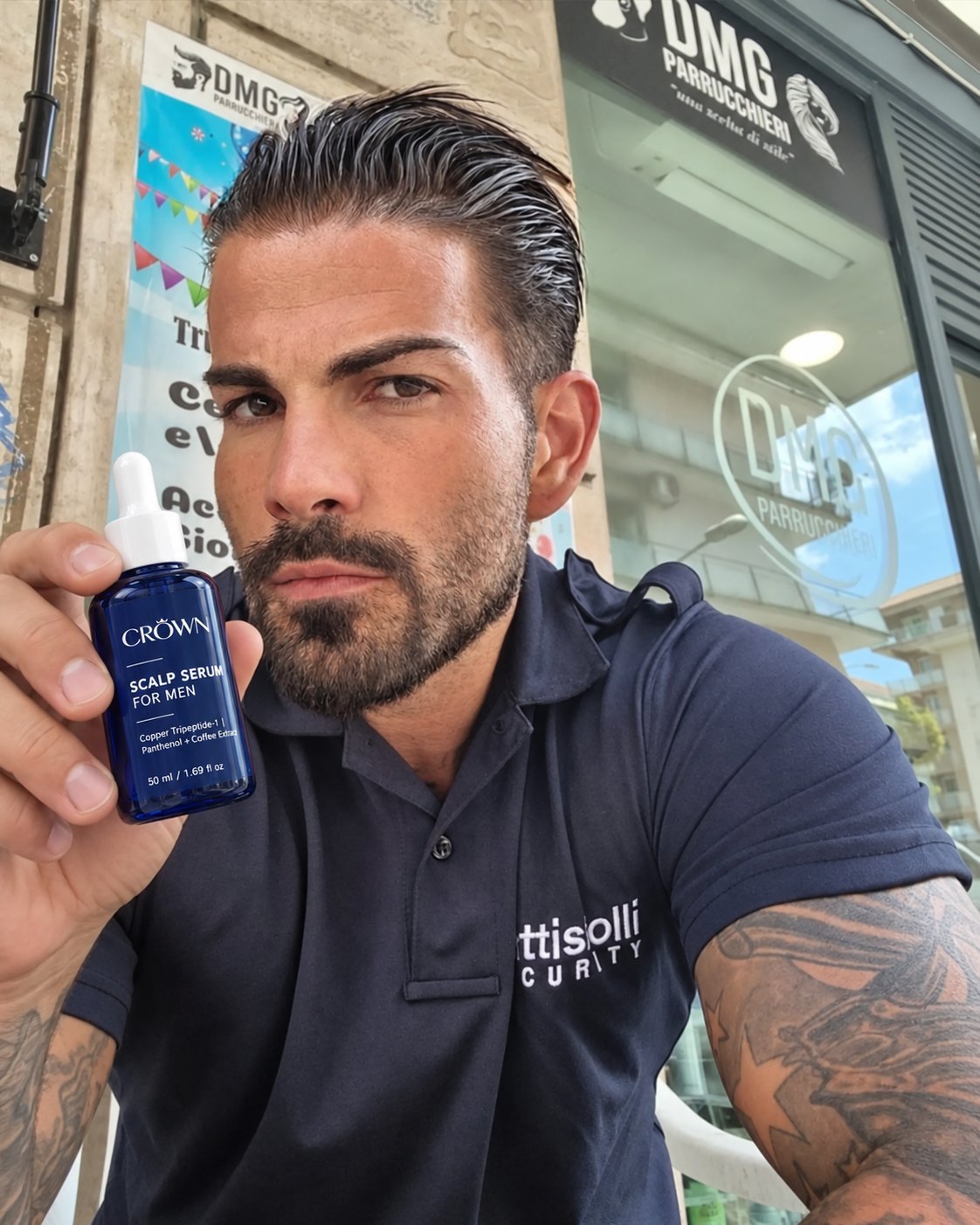 Man with slicked-back hair holding CROWN Scalp Serum for Men